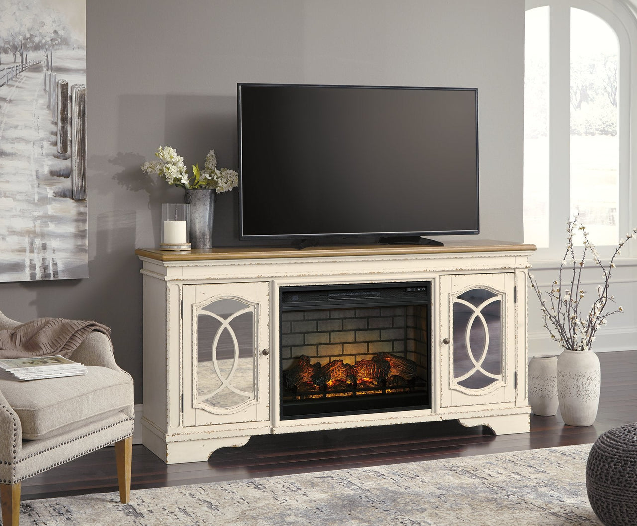 Realyn 74" TV Stand with Electric Fireplace image